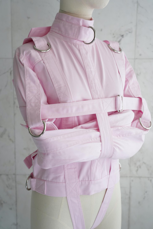 “Baby pink ABDL straitjacket with double crotch straps, welded D-rings, and heavy-duty canvas construction – The Strait Jackets”