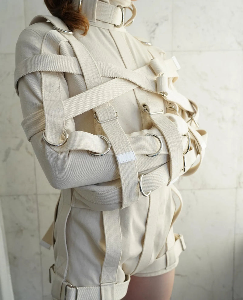 “MAX Security heavy-duty straitjacket bodysuit made of canvas with D-rings, crotch straps, and integrated shorts – The Strait Jackets”